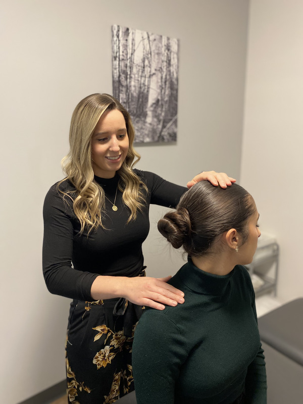 Chiropractic with her patient