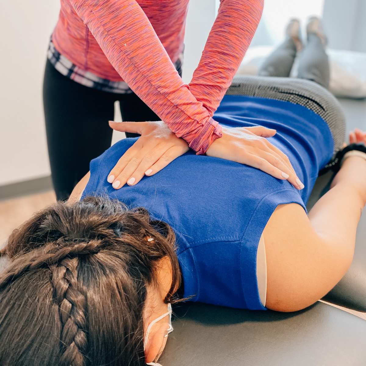 chiropractor attending to patient