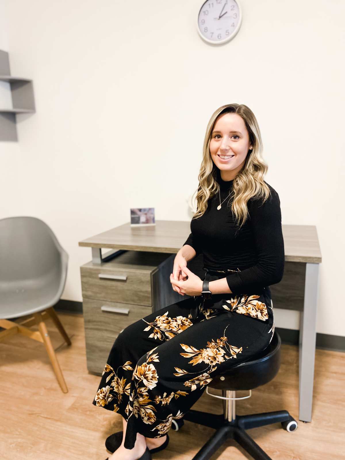 Dr. Vanessa sitting at a desk