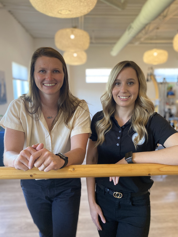 Two smiling women